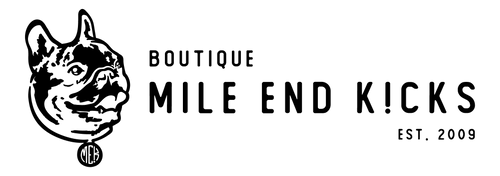 A black logo of a dog with the text Boutique Mile End Kicks Est. 2009 next to it.