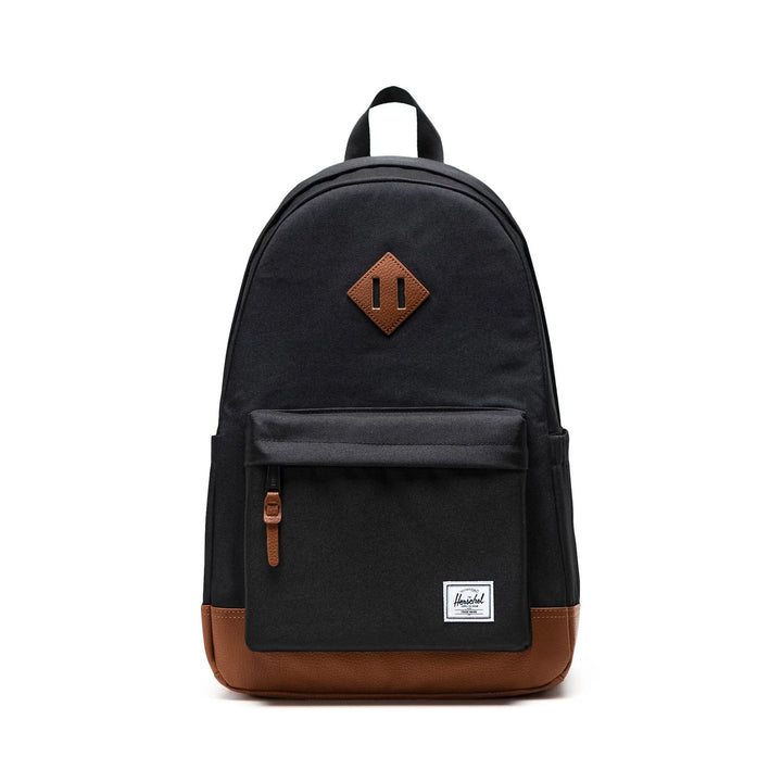 Black backpack with brown accents on a white background
