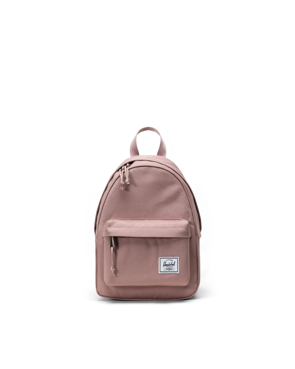 A compact pink Herschel Classic Mini Backpack with front pocket and brand label visible.