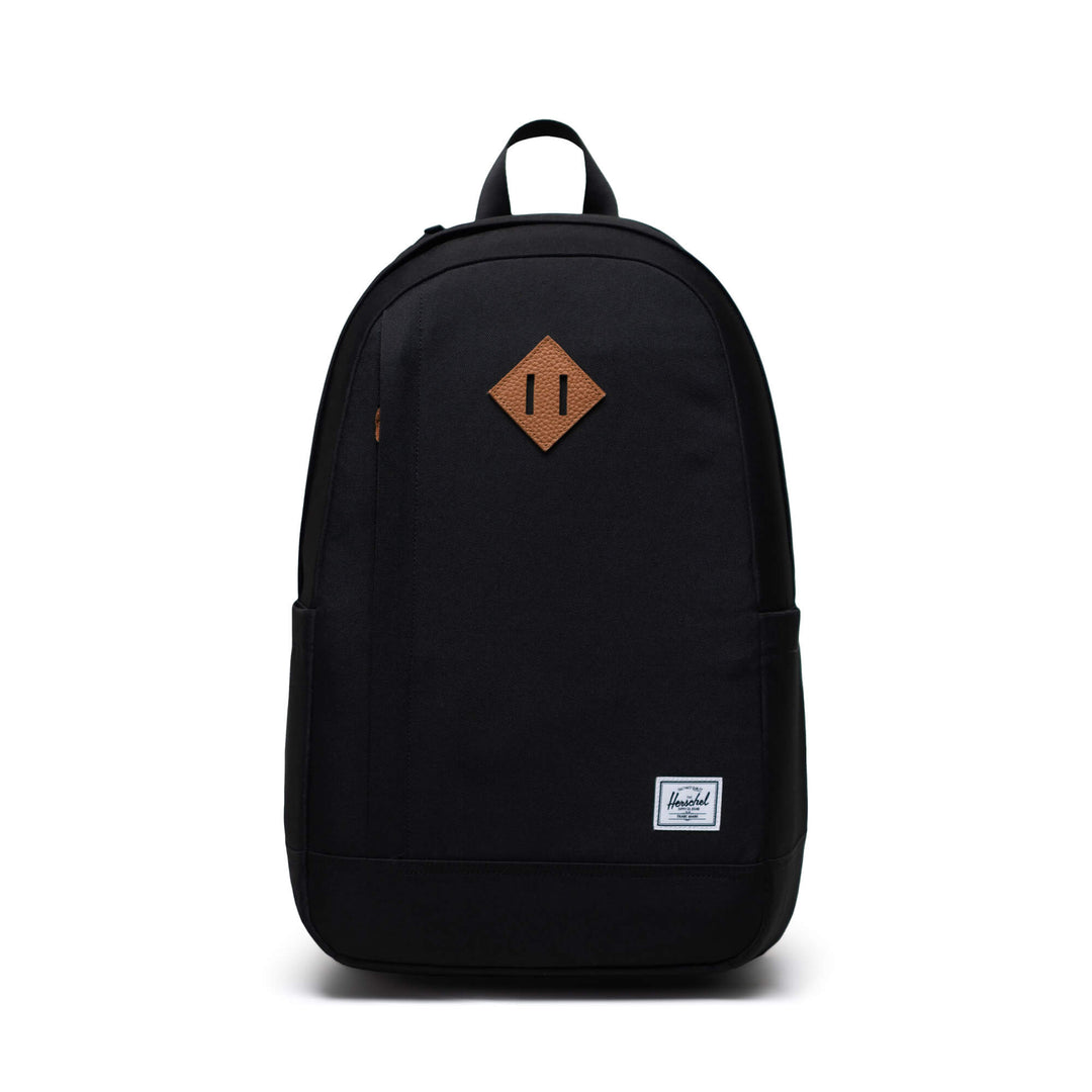 A black backpack on a white background