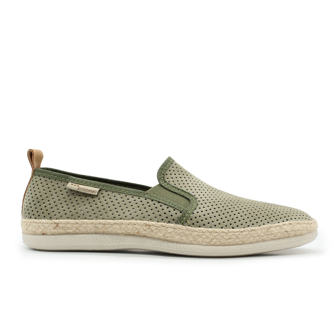 A green suede slip-on shoe with a perforated pattern and a lightweight sole.