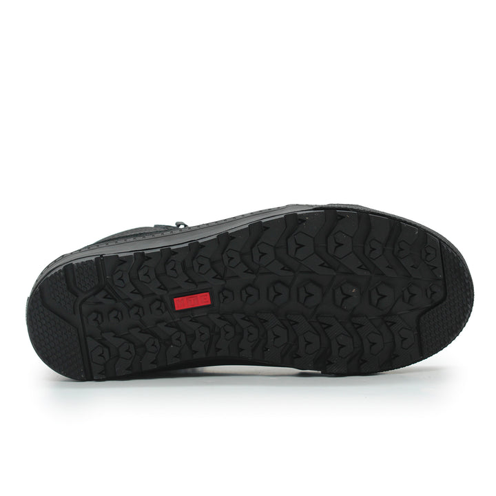 Black shoe sole with red label on a white background
