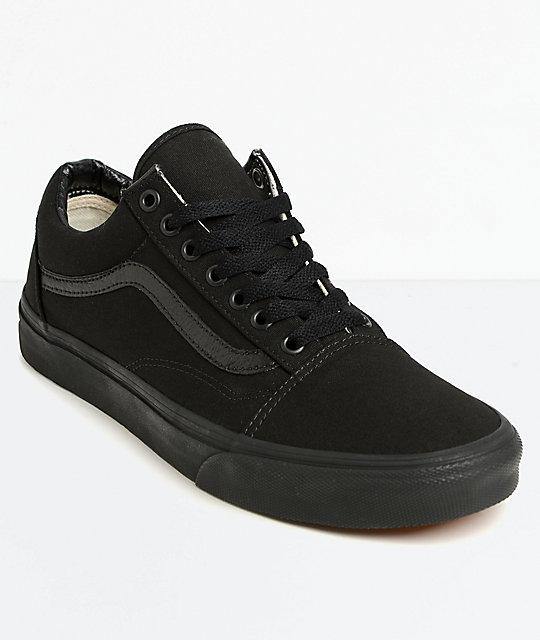 Vans Old Skool Canvas Shoes - Iconic Sidestripe Low-Top Design with Durable Construction and Signature Rubber Waffle Outsoles. Black/black color and side view.
