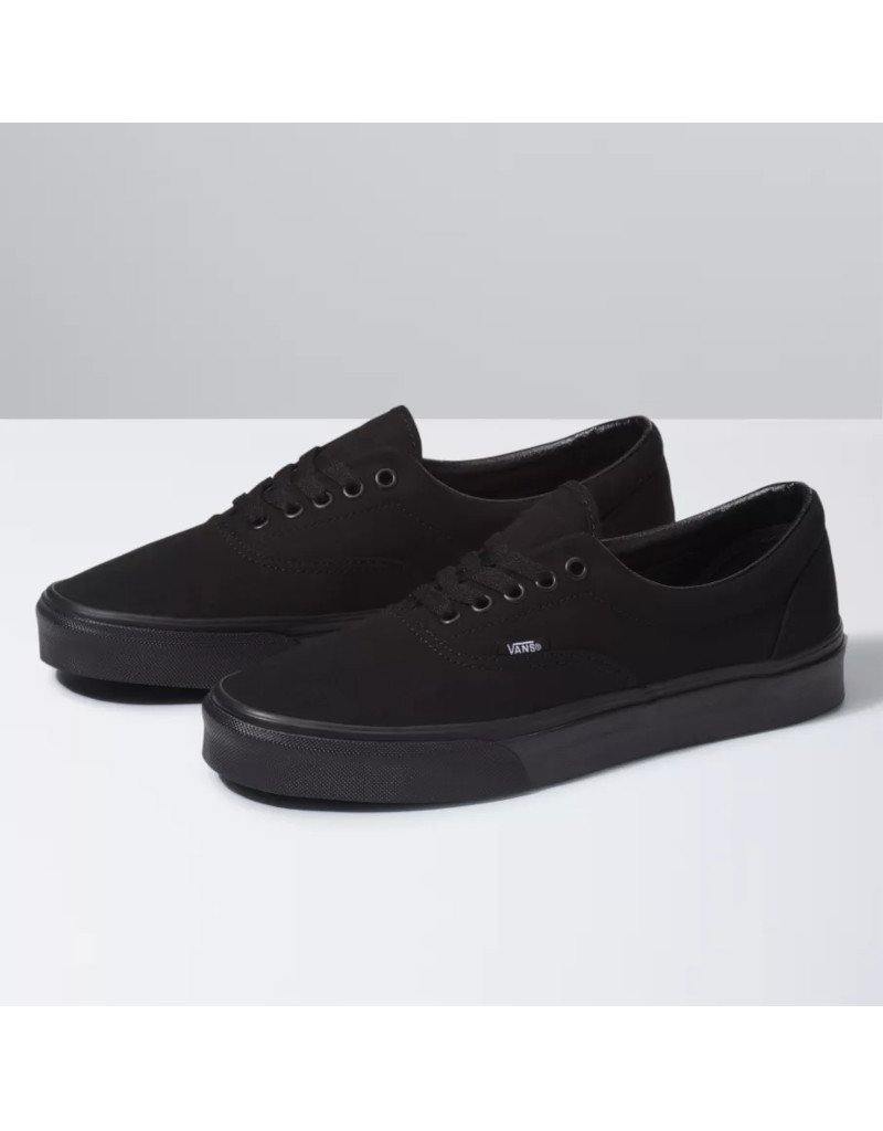 Vans Era Skate Shoe - Legendary low-top design with padded collars, sturdy canvas uppers, metal eyelets, and signature rubber waffle outsoles. A symbol of skate and street culture since 1976. Black/black color and shoes facing left