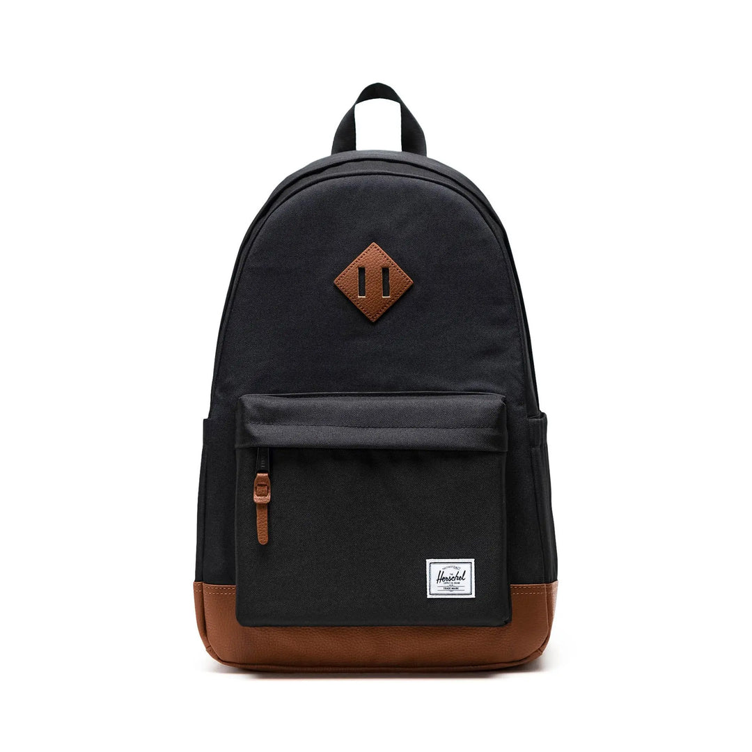 Black backpack with brown accents on a white background