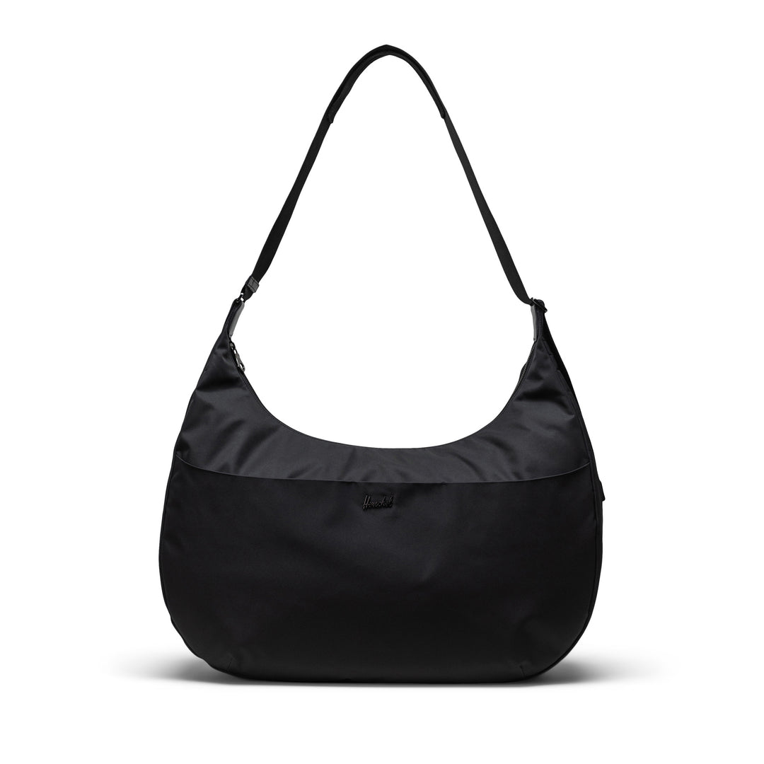 Black Herschel Yara Shoulder Bag with a quilted fabric design, a visible brand tag, and a key clip.