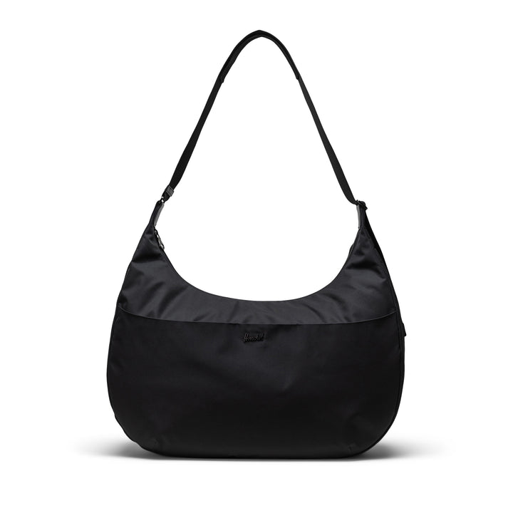 Black Herschel Yara Shoulder Bag with a quilted fabric design, a visible brand tag, and a key clip.