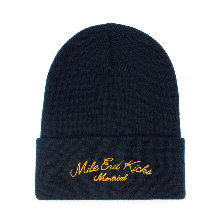 Navy beanie with yellow embroidered text on a white background