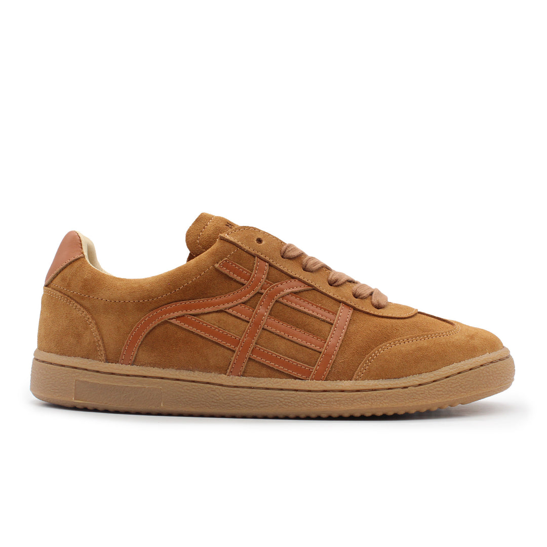 A brown suede sneaker with a gum sole.