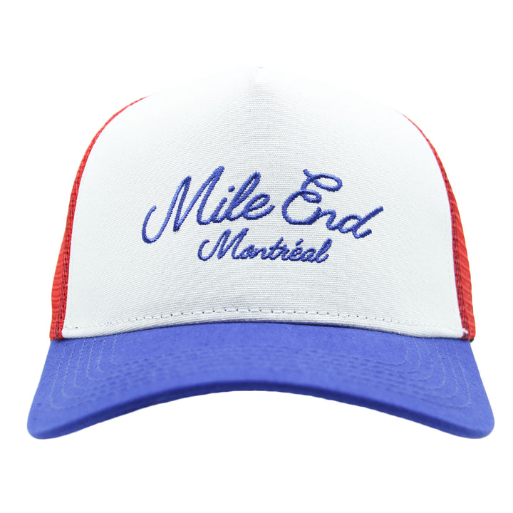 White and blue cap with red mesh and 'Mile End Montreal' text on a white background
