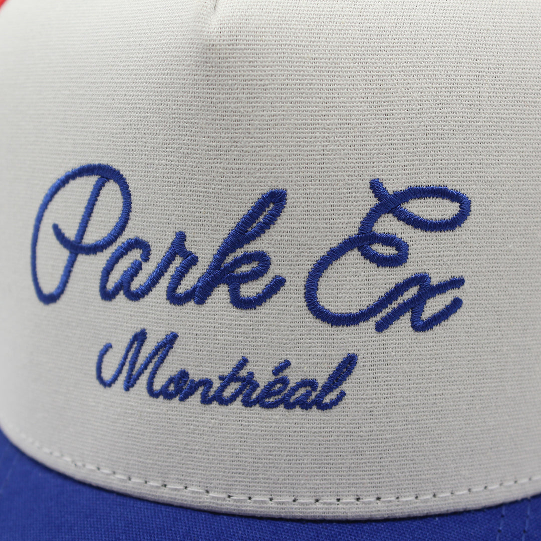 Close-up of a cap with 'Park Ex Montreal' embroidered on it.