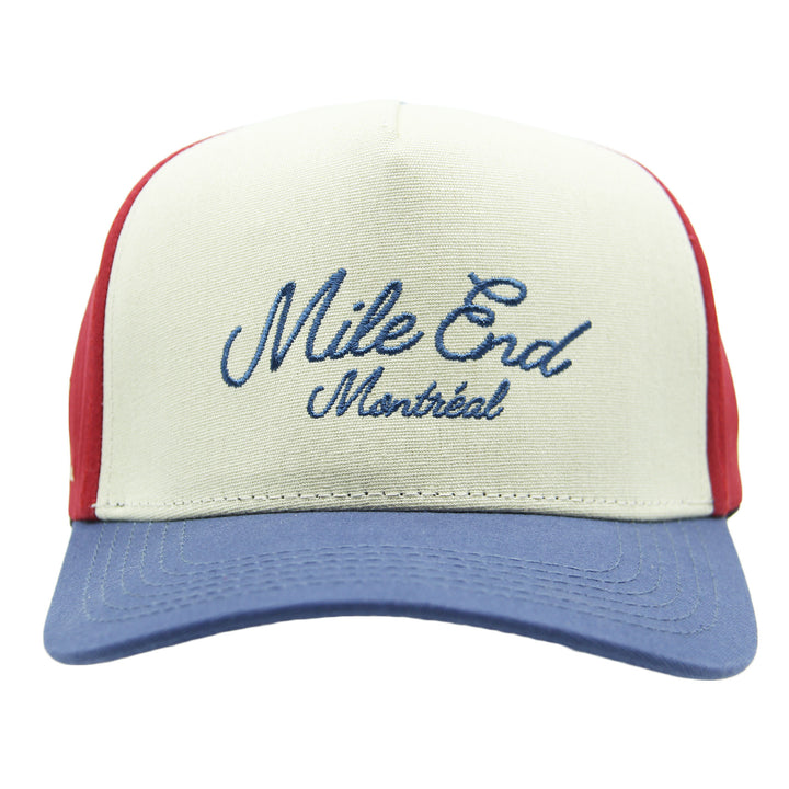 Trucker hat with 'Mile End Montreal' text on a white background