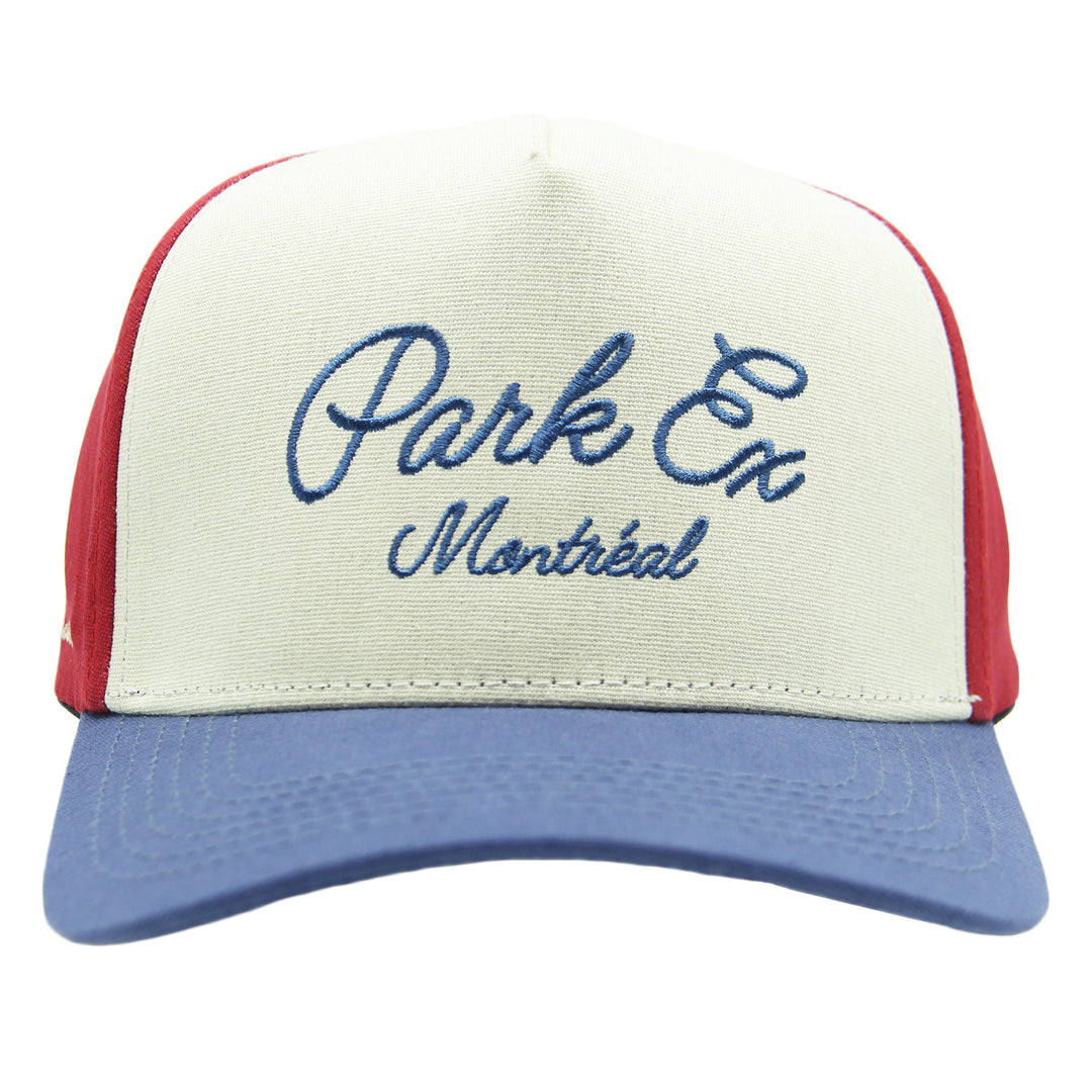 Trucker hat with 'Park Ex Montreal' text on a white background