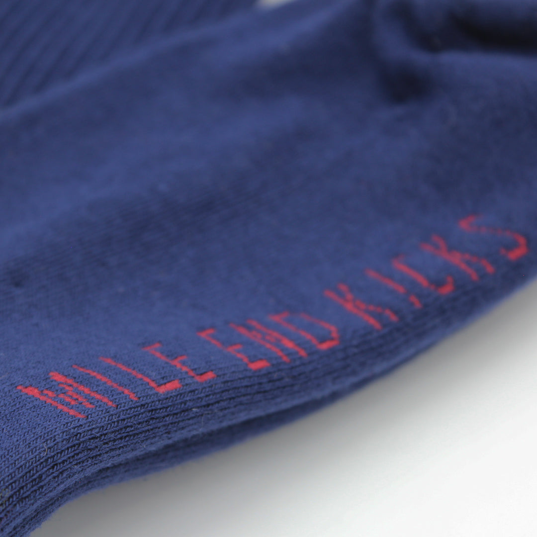 Blue sock with red text on a white background