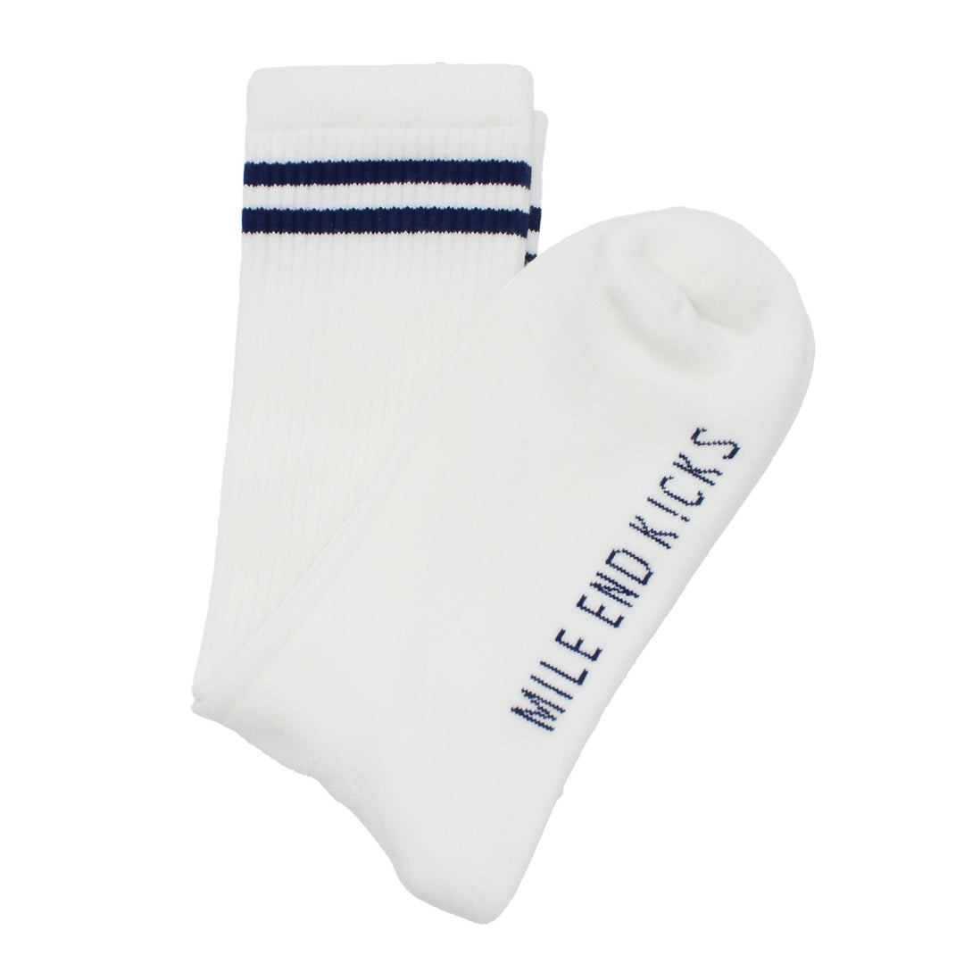 White socks with navy stripes and 'Mile End Kicks' text on a white background
