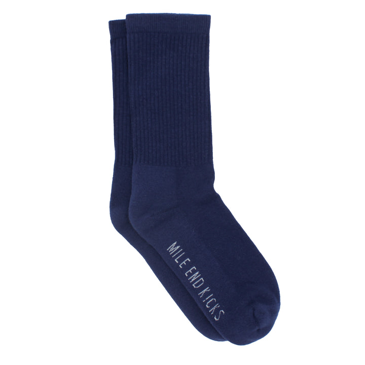 Navy blue sock with 'Mile End Kicks' branding on a white background