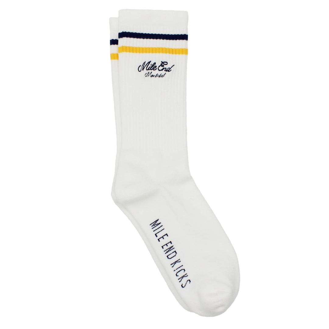 White sock with yellow and blue stripes and branding on a white background