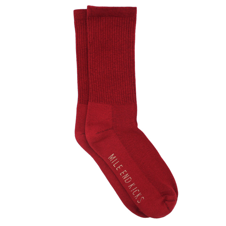 Red sock with 'Mile End Kicks' branding on a white background