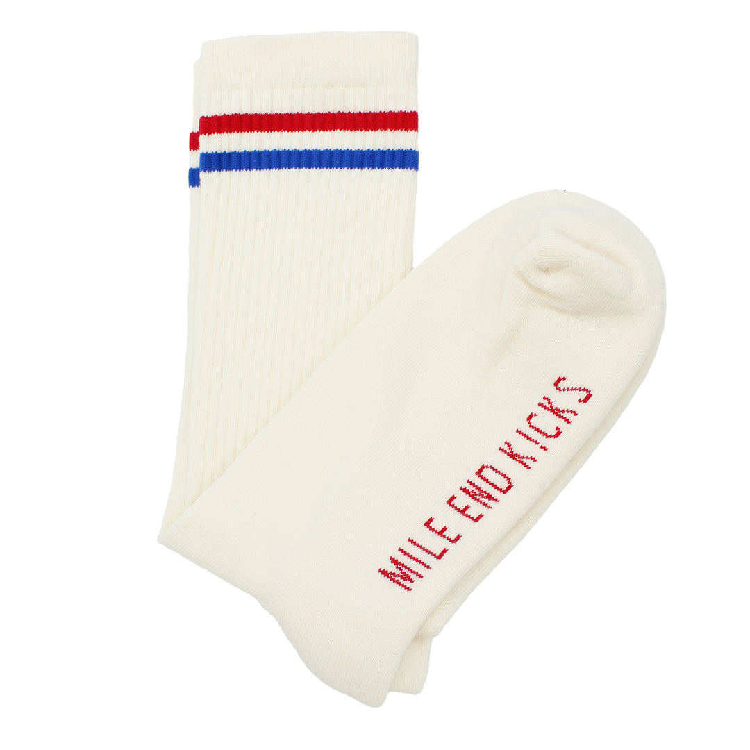 White sock with red and blue stripes and 'Mile End Kicks' text on a white background