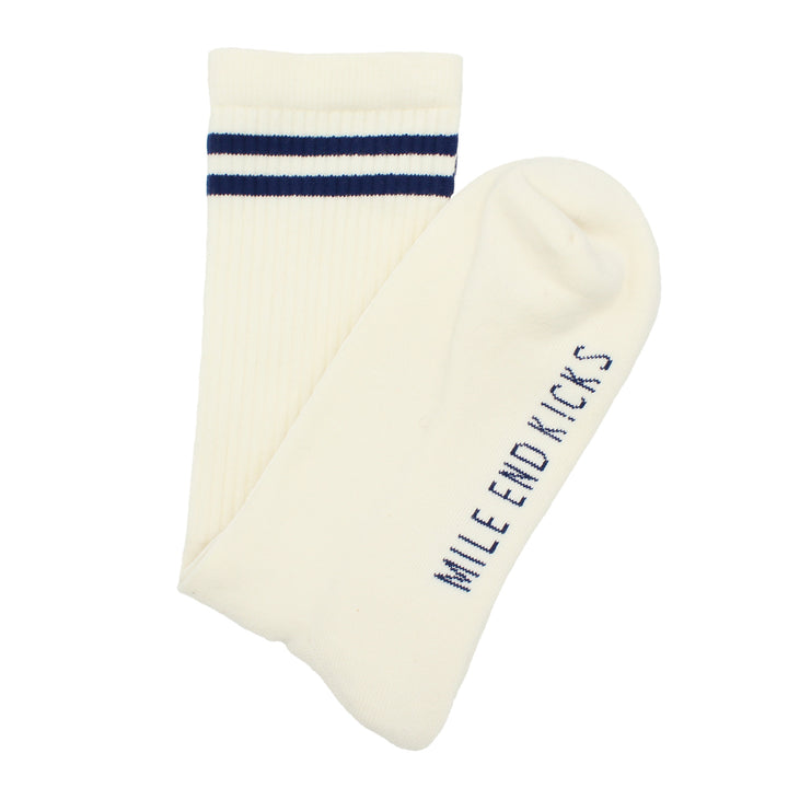 White sock with navy stripe and 'Mile End Kicks' text on a white background