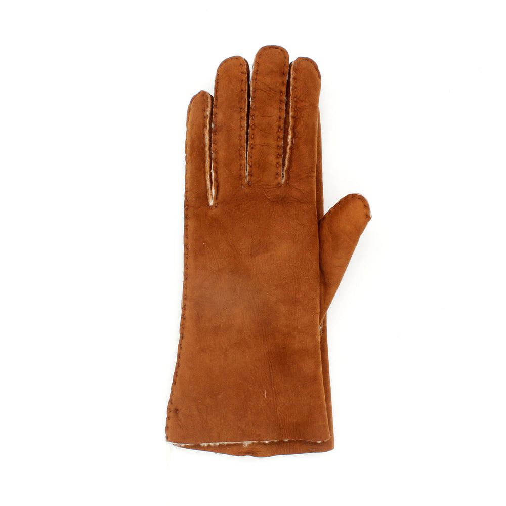 Brown leather glove on a white background