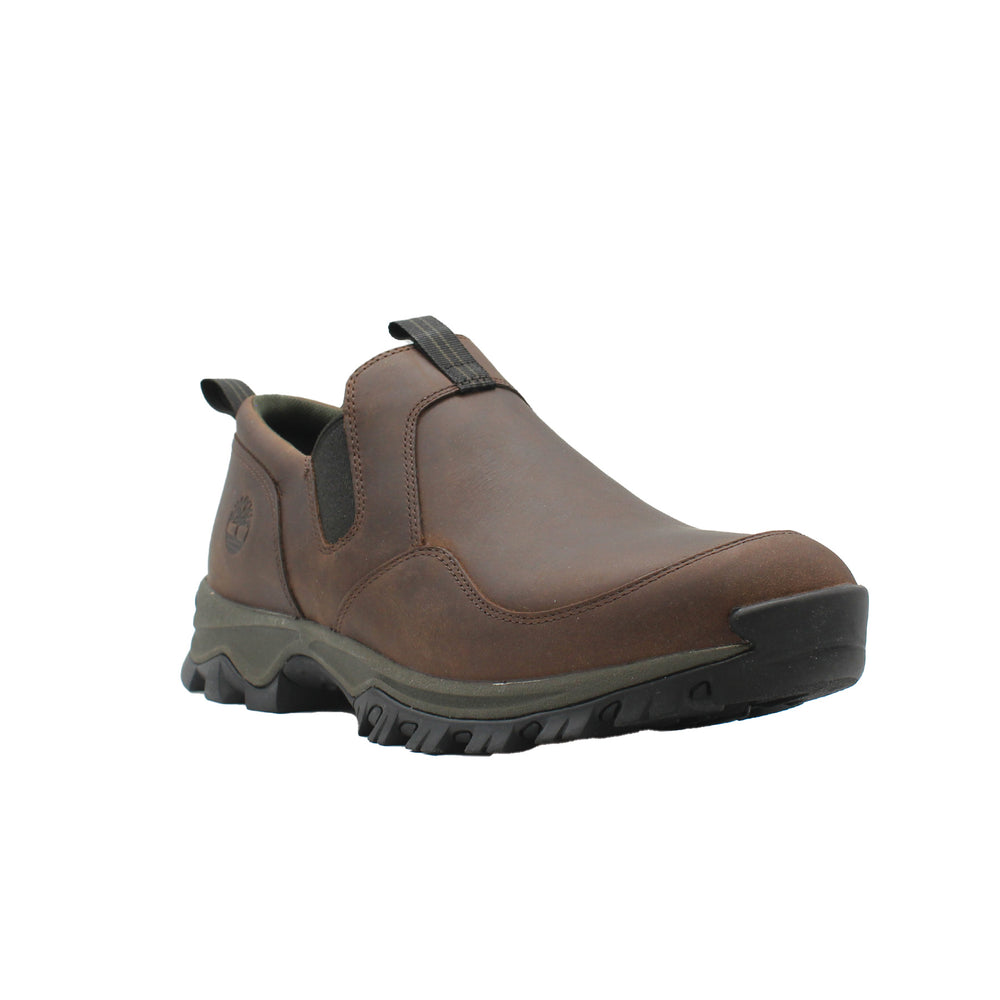Brown slip-on shoe with black sole on a white background