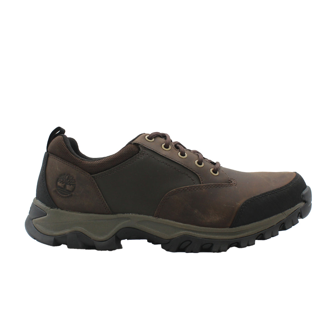 Brown leather shoe with black sole on a white background