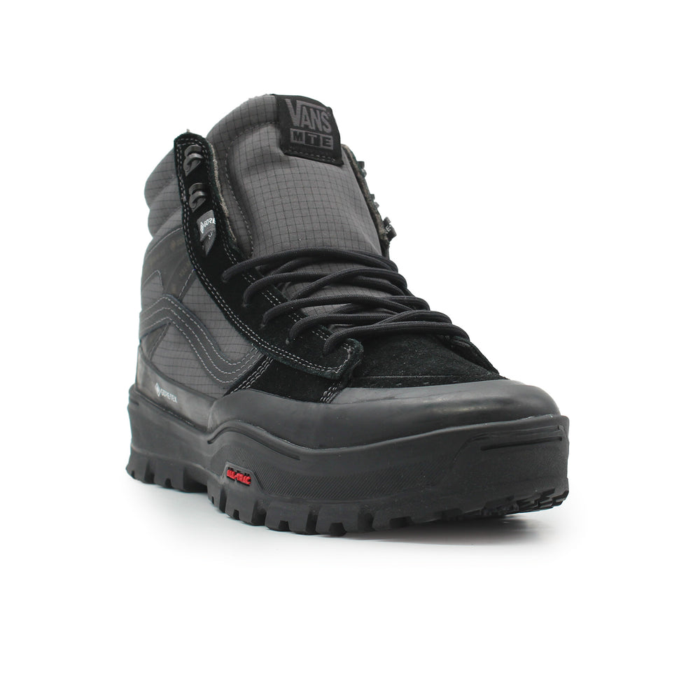 Black high-top sneaker with a textured pattern on a white background