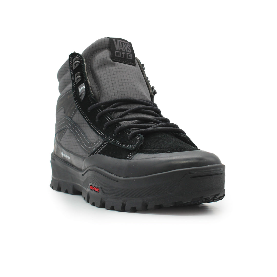 Black high-top sneaker with a textured pattern on a white background
