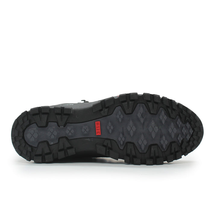 Black hiking boot sole on a white background