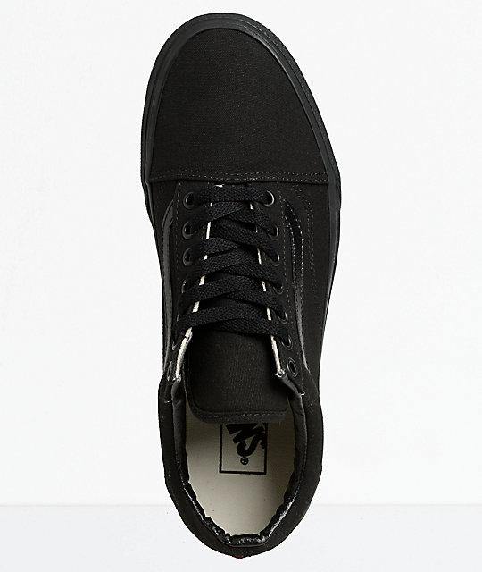 Vans Old Skool Canvas Shoes - Iconic Sidestripe Low-Top Design with Durable Construction and Signature Rubber Waffle Outsoles. Black/black color and top view.