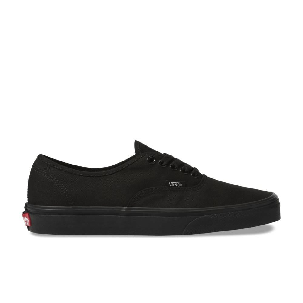 Vans Authentic low-top sneakers in a classic canvas design, featuring sturdy uppers in seasonal colors. The iconic rubber waffle outsole and lace-up closure provide a timeless look for creative and casual styles. Black/black color and Right facing angle view.